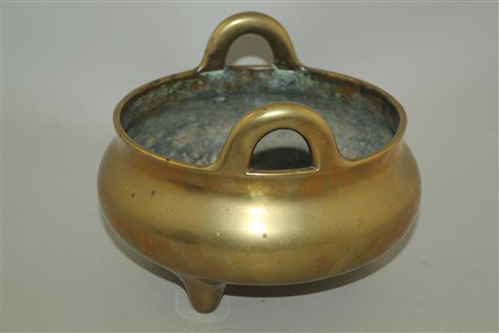 A large Chinese bronze tripod censer, Ding, Xuande six character mark, probably 18th / 19th century, diam. 20.5cm, weight 2030g.